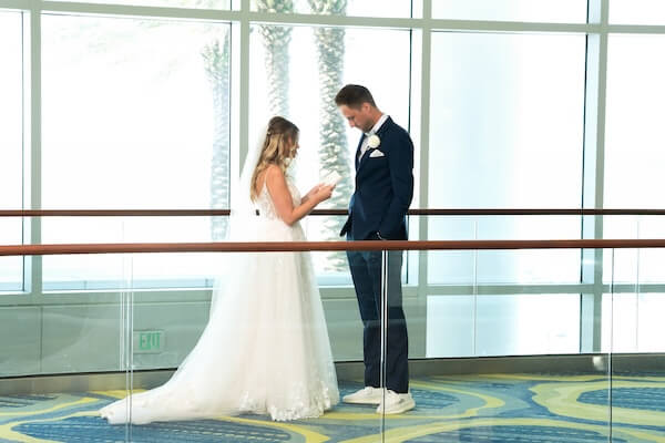 A bride and groom's first look and private wedding vows.