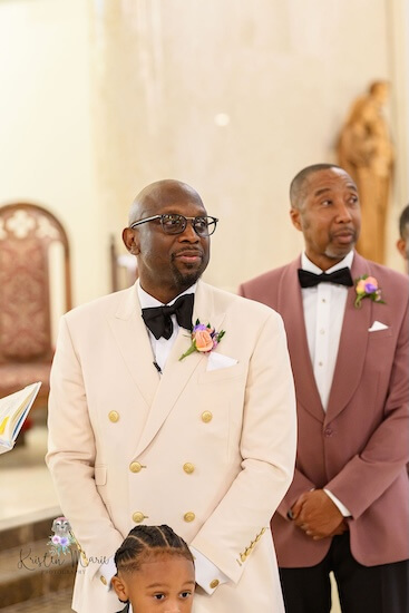 Tampa groom looking on as his birde walks down the aisle.