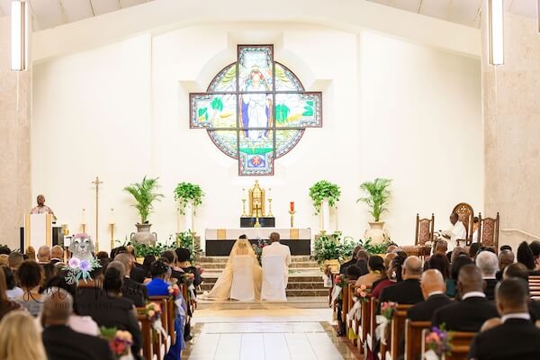 A wedding ceremony at Christ The King Catholic church in Tampa.