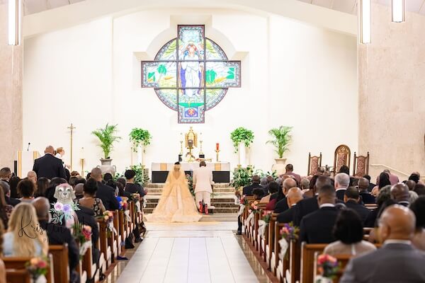 A wedding ceremony at Christ The King Catholic church in Tampa.