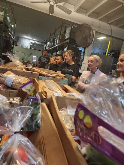 Special Moments Event Planning team volunteering at Hope Villlages of America.